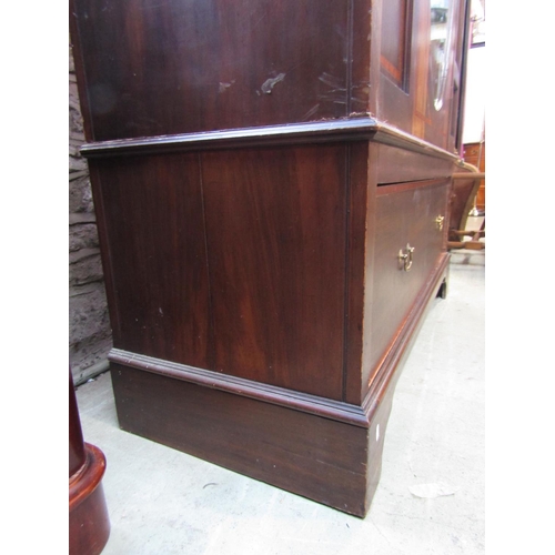 2356 - An inlaid Edwardian walnut wardrobe with satinwood crossbanding and moulded cornice over a central t... 