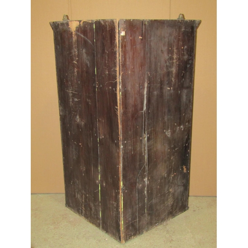 2359 - A 19th century oak hanging corner cabinet enclosed by a rectangular astragal glazed panelled door re... 