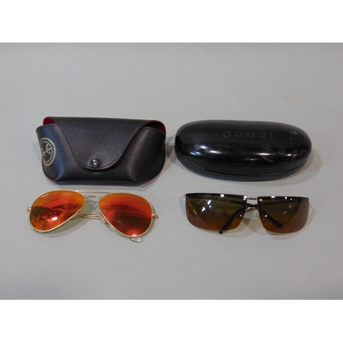 1553 - 2 pairs designer sunglasses by Ray Ban and Gucci with cases, a suede purse by Anya Hindmarch and a l... 