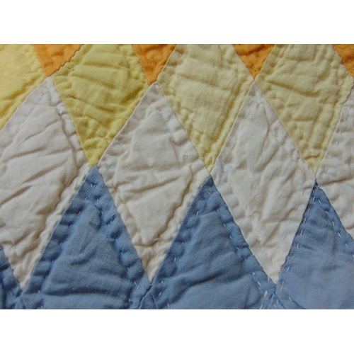 1558 - Circ 1930 traditional hand stitched patchwork quilt featuring a sunburst design of patchworked diamo... 