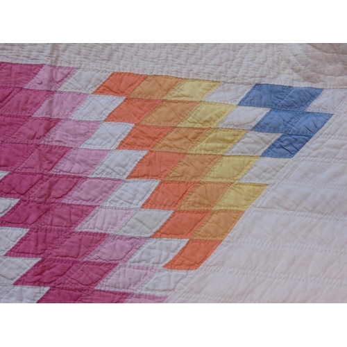 1558 - Circ 1930 traditional hand stitched patchwork quilt featuring a sunburst design of patchworked diamo... 