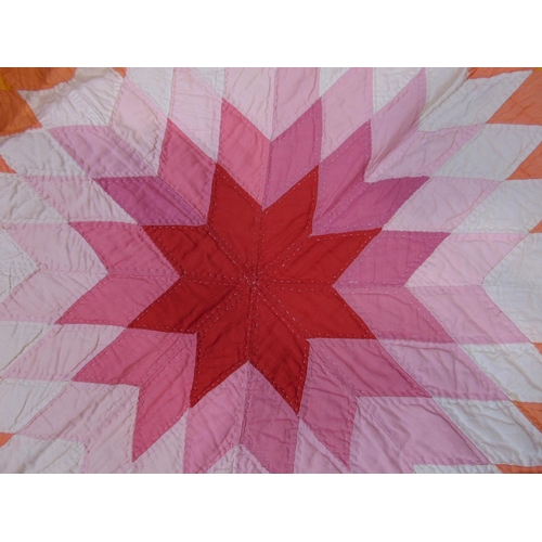 1558 - Circ 1930 traditional hand stitched patchwork quilt featuring a sunburst design of patchworked diamo... 