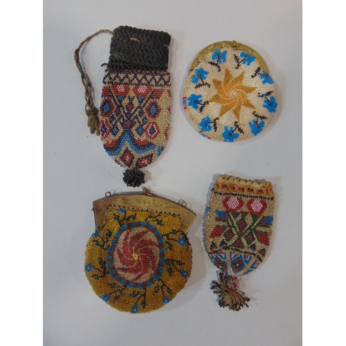 1562 - Collection of vintage beadwork including 2 early 20th century purses with clasps, a draw string purs... 