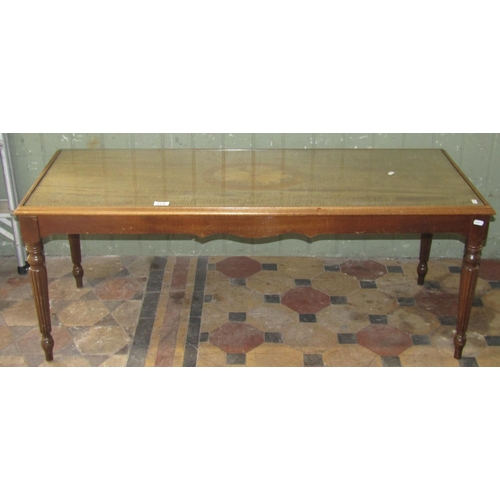 2375 - A reproduction occasional table of rectangular form with inlaid marquetry panel and inset plate glas... 