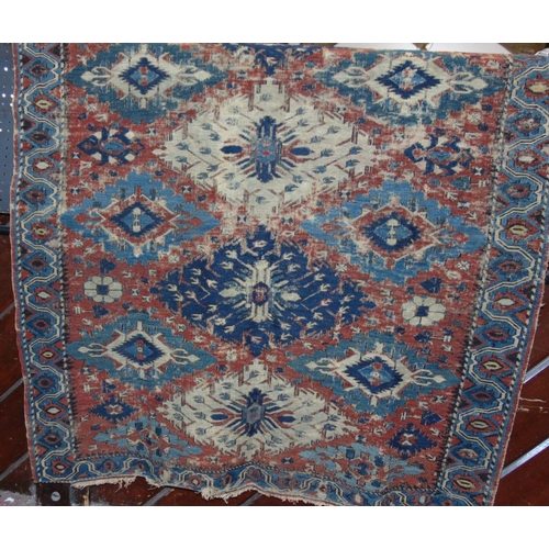 1554 - Mixed textiles including a Sumak rug (AF) 160 x 110cm, a Persian prayer mat (AF), 5 hand worked cros... 