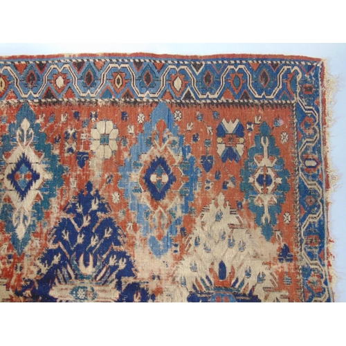 1554 - Mixed textiles including a Sumak rug (AF) 160 x 110cm, a Persian prayer mat (AF), 5 hand worked cros... 