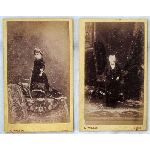 219 - a set of five 19th century portrait photographs of a mother and four children, all of oval form, 7.5... 