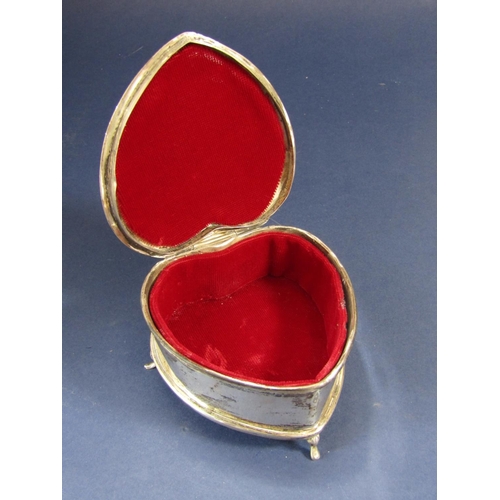 1324 - Silver heart shaped vitrine or jewellery casket, the hinged lid enclosing a lined interior, makers m... 