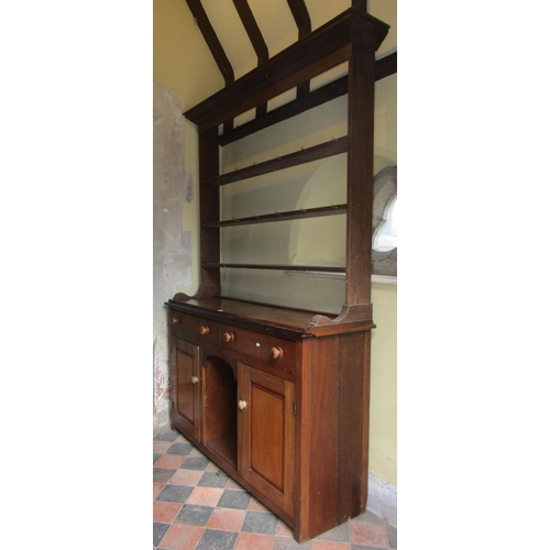 2418 - A 19th century cottage dresser, the lower section enclosed by two panelled doors and two drawers wit... 