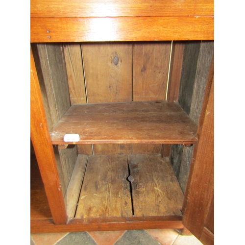 2418 - A 19th century cottage dresser, the lower section enclosed by two panelled doors and two drawers wit... 