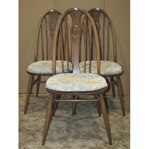 2162 - A set of six Ercol stained beechwood Windsor style hoop and stick back dining chairs, with shaped sp... 