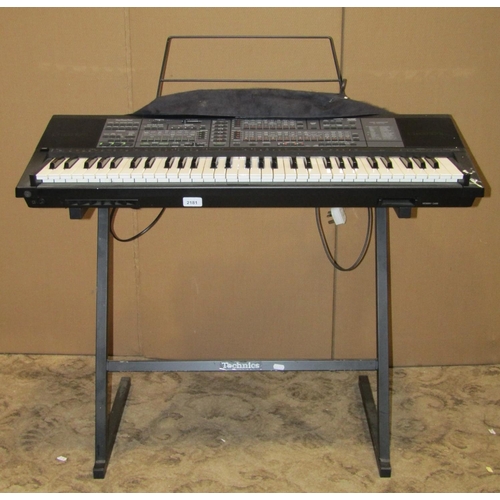 2181 - A Technics Electric PCM Keyboard, model SX-K700 and stand