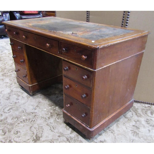 2195 - A Victorian mahogany kneehole twin pedestal, three sectional desk with worn inset leather panel top ... 