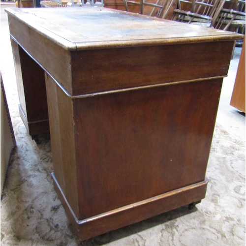 2195 - A Victorian mahogany kneehole twin pedestal, three sectional desk with worn inset leather panel top ... 