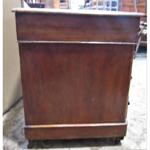 2195 - A Victorian mahogany kneehole twin pedestal, three sectional desk with worn inset leather panel top ... 