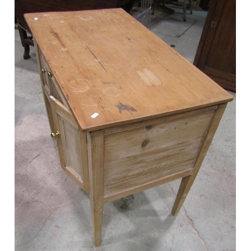 2200 - A rustic stripped pine kneehole side or dressing table fitted with a central frieze drawer flanked b... 