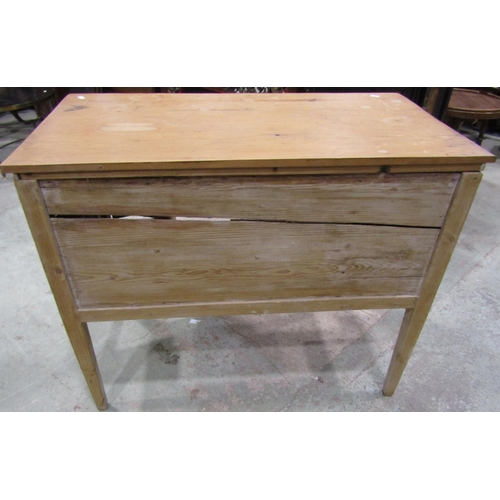 2200 - A rustic stripped pine kneehole side or dressing table fitted with a central frieze drawer flanked b... 