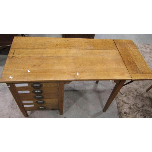 2202 - A vintage oak kneehole single pedestal desk, fitted with four long drawers and drop leaf, raised on ... 