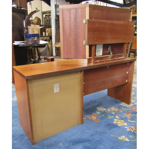 2205 - A Stag teak bedroom pair comprising kneehole single pedestal dressing table, fitted with three long ... 