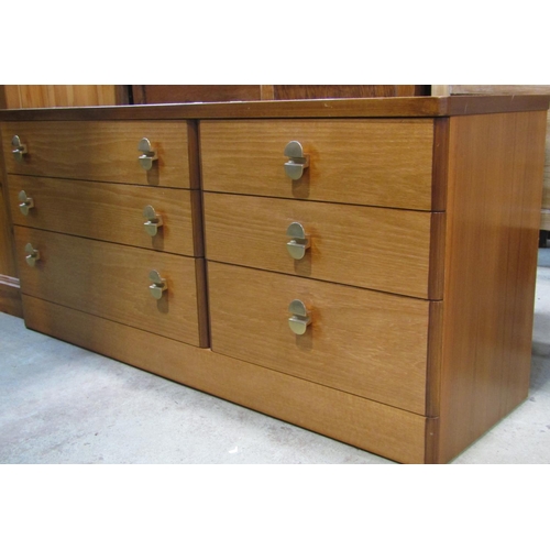 2205 - A Stag teak bedroom pair comprising kneehole single pedestal dressing table, fitted with three long ... 