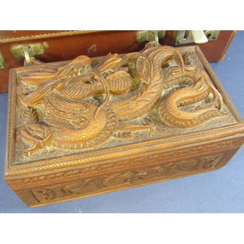 1908 - A Japanese carved box mounted by a coiled dragon together with a leather briefcase (2)