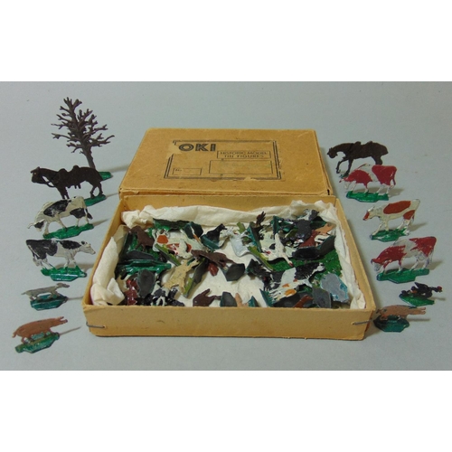 119 - Collection of vintage toys including boxed OKI tin plate farm animals, ceramic half doll brush, a fu... 