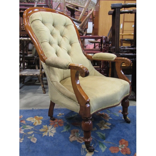 2251 - A Victorian spoon back drawing room chair with upholstered serpentine shaped seat, button back and a... 