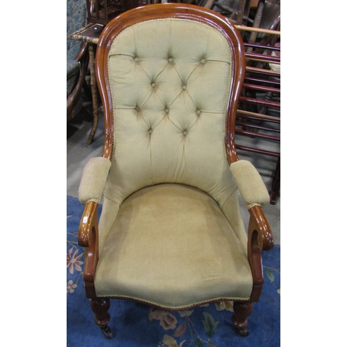 2251 - A Victorian spoon back drawing room chair with upholstered serpentine shaped seat, button back and a... 