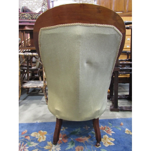 2251 - A Victorian spoon back drawing room chair with upholstered serpentine shaped seat, button back and a... 