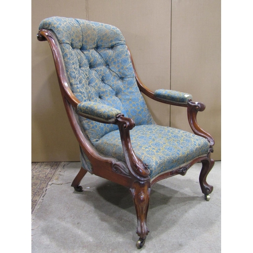 2254 - A Victorian rosewood drawing room chair with floral patterned serpentine shaped upholstered seat, sc... 