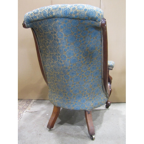 2254 - A Victorian rosewood drawing room chair with floral patterned serpentine shaped upholstered seat, sc... 