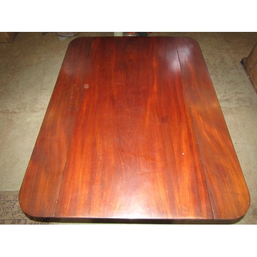 2261 - A 19th century mahogany breakfast table, the rectangular top with two short extension leaves with ro... 