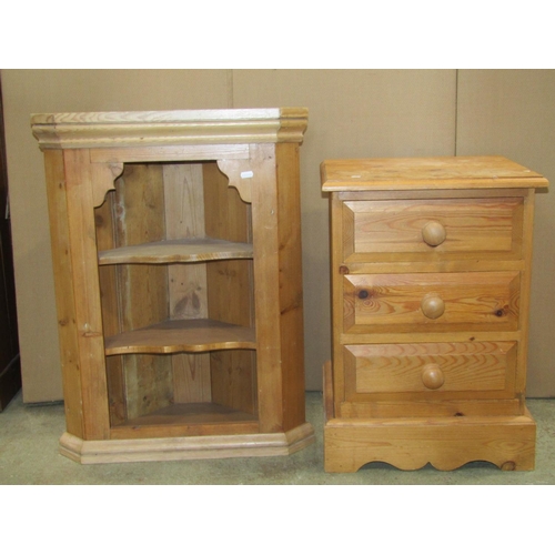 2284 - A solid pine three drawer bedside chest, further stripped pine hanging corner cupboard with two fixe... 