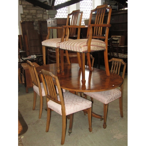 2288 - A good quality Regency style yew wood veneered D end extending dining table with single additional l... 