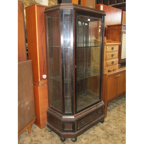 2294 - An antique continental display cabinet, freestanding and enclosed by a central three quarter length ... 