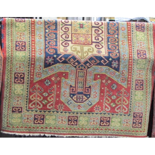 2458 - Kazak Caucasian full pile rug with central pastel medallion upon pale ground, 220 x 155 cm