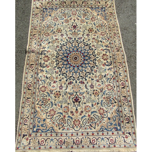 2464 - A good quality Tabriz Persian rug, with central floral medallion flamed by further blue scrolled fol... 