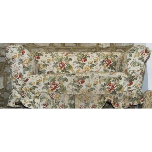 2322 - An Edwardian/1920s two tier two seat Chesterfield sofa with floral patterned upholstery together wit... 