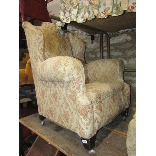 2322 - An Edwardian/1920s two tier two seat Chesterfield sofa with floral patterned upholstery together wit... 