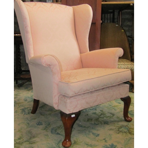 2336 - A Parker Knoll two seat sofa in the Queen Anne style with light pink floral patterned upholstered fi... 