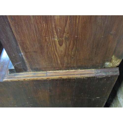 2372 - A Georgian mahogany and pine sided two sectional side cupboard, the upper recessed and enclosed by a... 