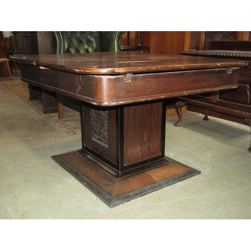 2283 - An art deco extending dining table, raised on a square cut pillar and platform base, the pillar with... 