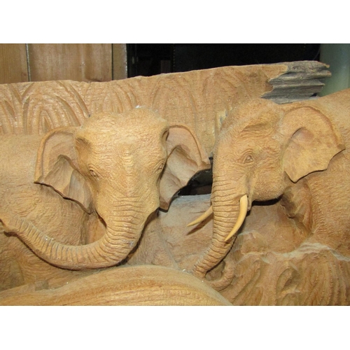 2419 - A carving/study of a troop of African Elephants, carved from a weathered rustic log, mounted on a co... 