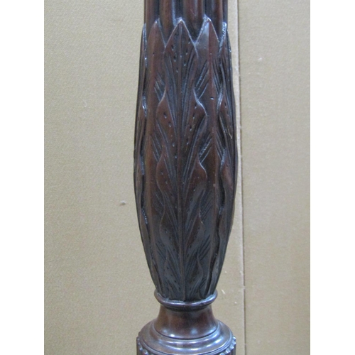 2345 - A mahogany torchere in the Hepplewhite style with reeded and carved pillar and swept tripod, 138 cm ... 