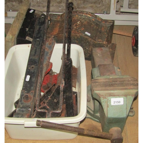 2150 - A heavy cast iron bench vice, together with a reclaimed cast iron drain water hopper and further rec... 