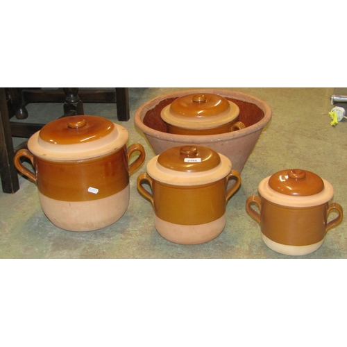 2155 - A terracotta crock or dairy pan of circular tapered form with glazed interior, together with four pa... 