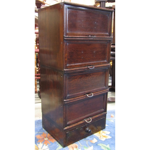 2357 - A vintage oak veneered floorstanding filing cabinet enclosed by four up and over rectangular panelle... 