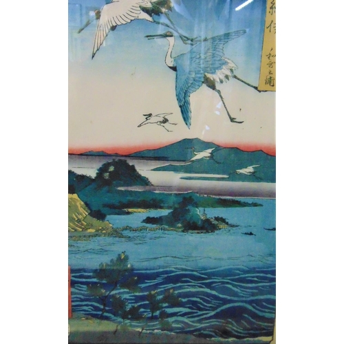 271 - Two Japanese wood block coloured prints, one of an eagle soaring over a lake, the other of cranes fl... 