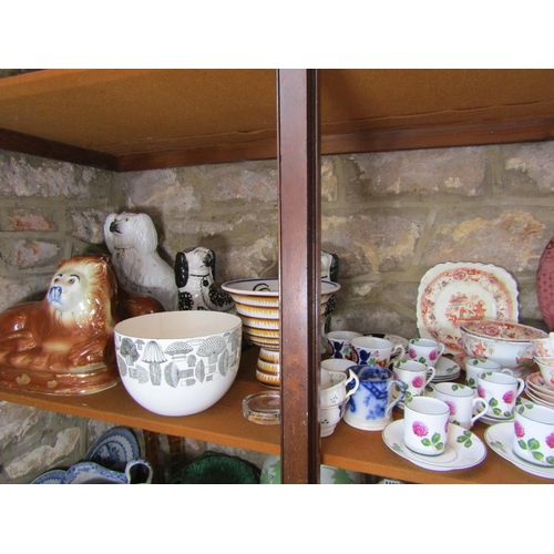 1101 - A miscellaneous collection of 19th century and later ceramics including a white glazed mirror frame ... 