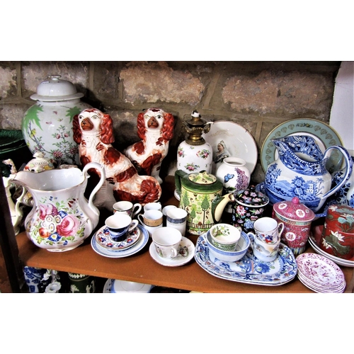 1103 - A collection of miscellaneous ceramics including a matched pair of 19th century Staffordshire spanie... 